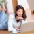 Woman laying on floor with laptop