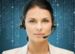 Woman on phone headset with letters floating in background