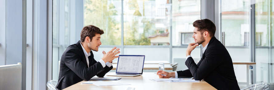 business meeting between two white men