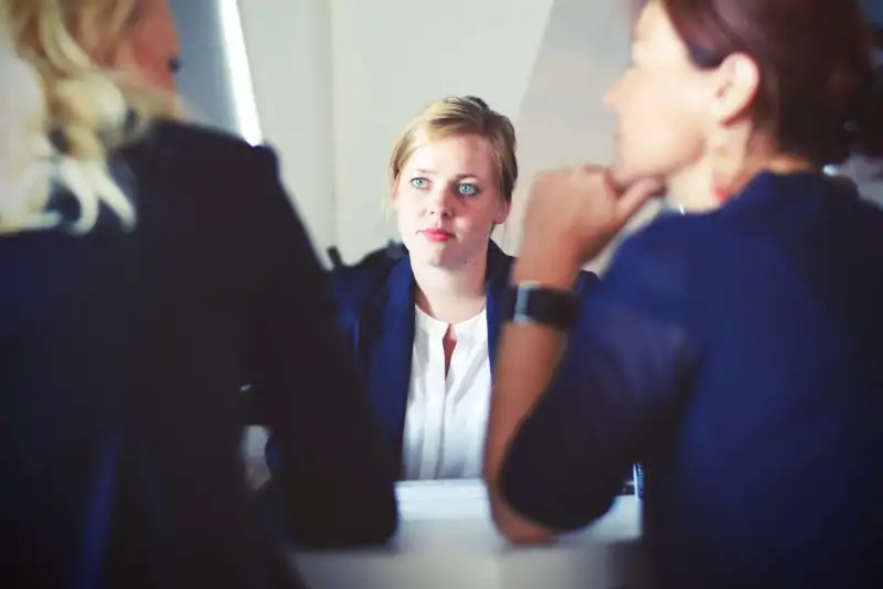 lawyer listening to two clients