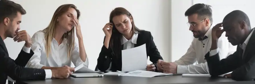 frustrated employees annoyed by meeting