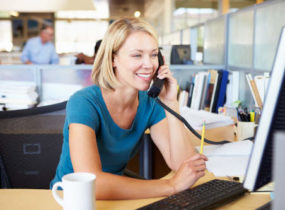 woman on voip phone talking to customer