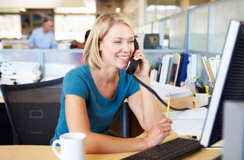 woman on voip phone talking to customer